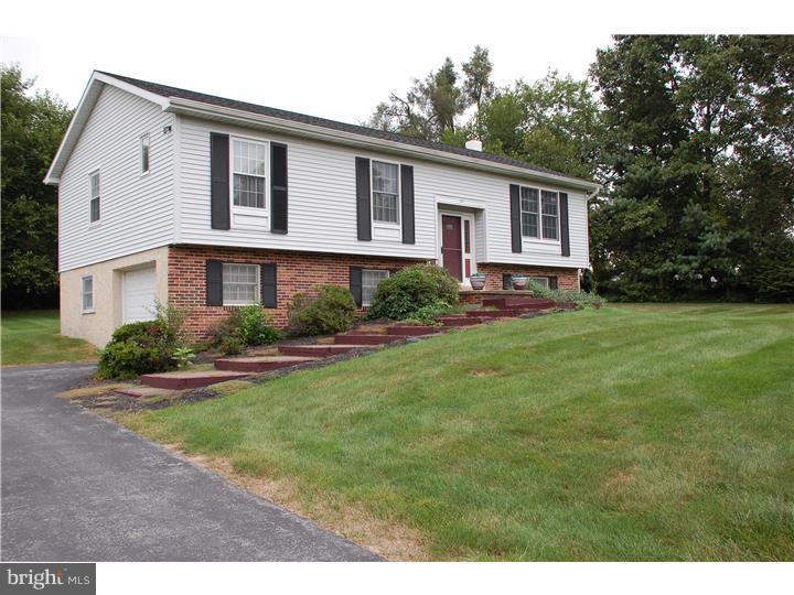 185 Old Spring Road Coatesville, PA 19320 - Photo 1 of 16 a front view of house with yard and green space