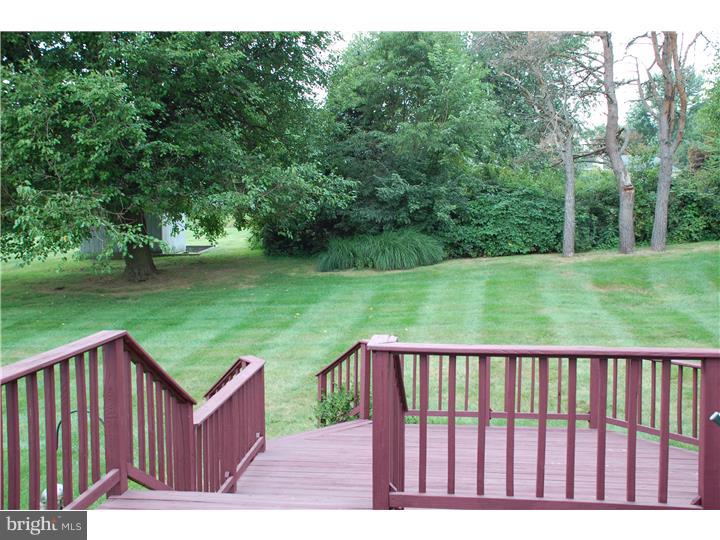 185 Old Spring Road Coatesville, PA 19320 - Photo 11 of 16 a street view with a garden
