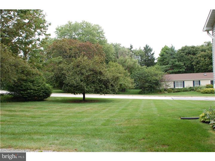 185 Old Spring Road Coatesville, PA 19320 - Photo 16 of 16 a view of a swimming pool with a yard