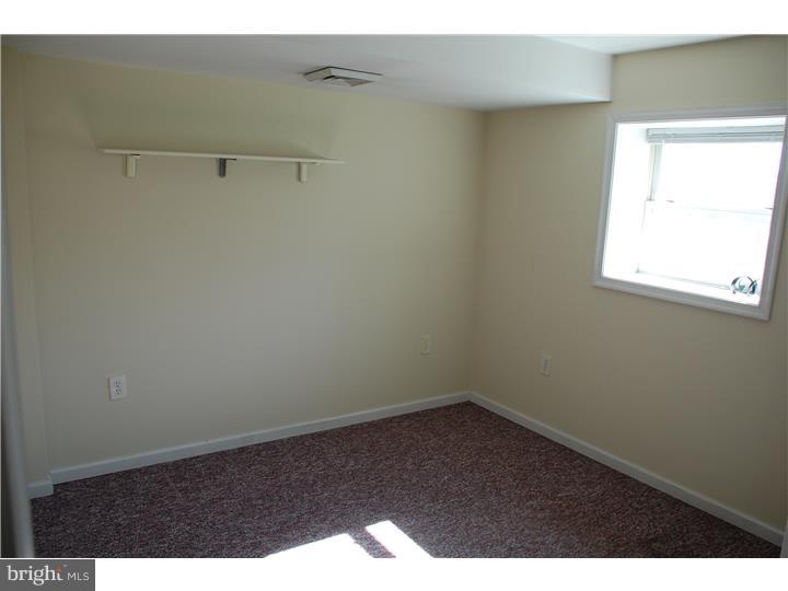 185 Old Spring Road Coatesville, PA 19320 - Photo 8 of 16 an empty room with a window