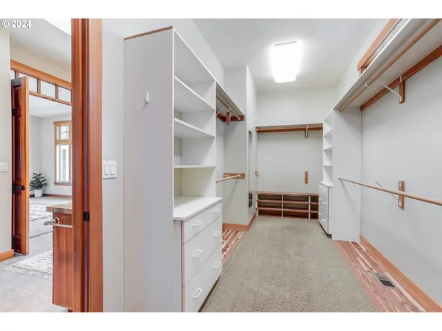 a view of entryway with stairs and a way to kitchen