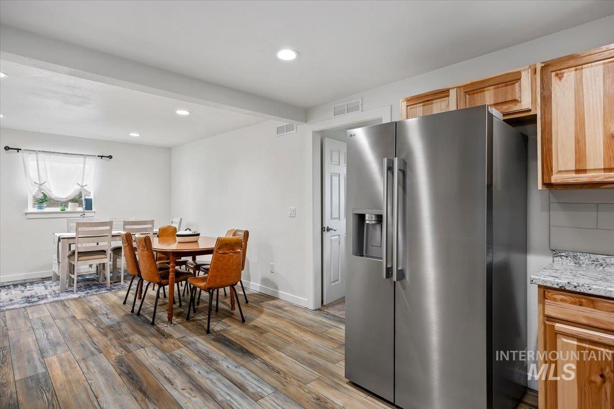 3536 North 2300 E Road Filer, ID 83328 - Photo 10 of 47 Dining area featuring light wood finished floors and recessed lighting