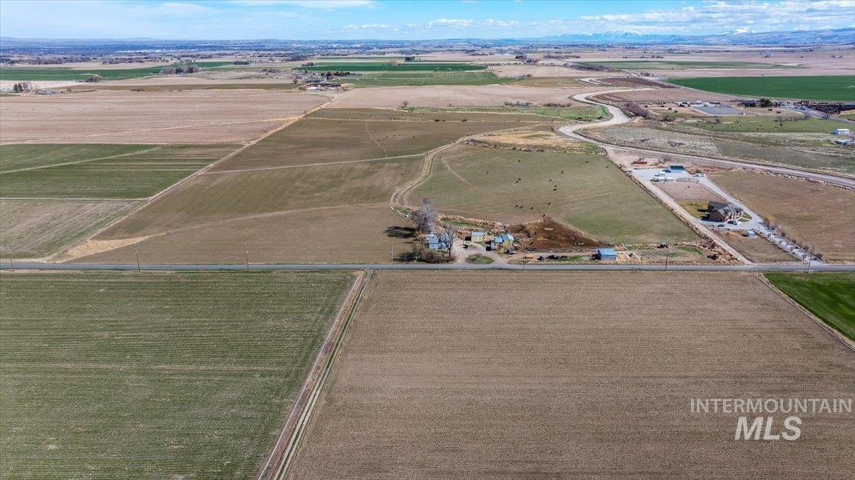 3536 North 2300 E Road Filer, ID 83328 - Photo 31 of 47 Aerial overview of property's location featuring rural landscape and large plots for crops