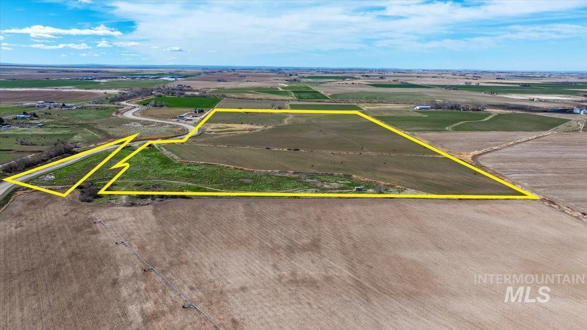 3536 North 2300 E Road Filer, ID 83328 - Photo 40 of 47 View of rural area featuring property parcel outlined and rows of crops