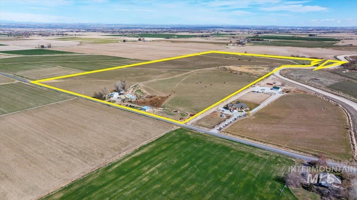 3536 North 2300 E Road Filer, ID 83328 - Photo 44 of 47 Aerial view of sparsely populated area with property parcel outlined and large plots for crops