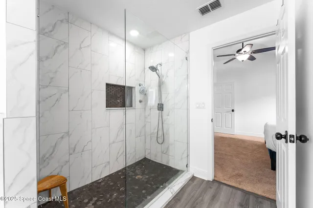 a view of a bathroom with a shower