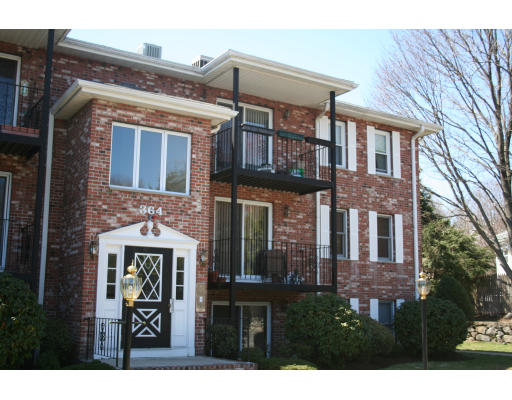 364 Neponset Street, Unit G Canton, MA 02021 - Photo 1 of 14 a view of a brick building with large windows