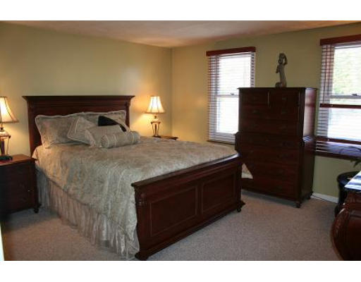 364 Neponset Street, Unit G Canton, MA 02021 - Photo 11 of 14 a bedroom with a bed and a window