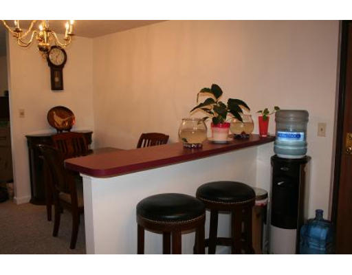 364 Neponset Street, Unit G Canton, MA 02021 - Photo 10 of 14 a table and chairs in a kitchen