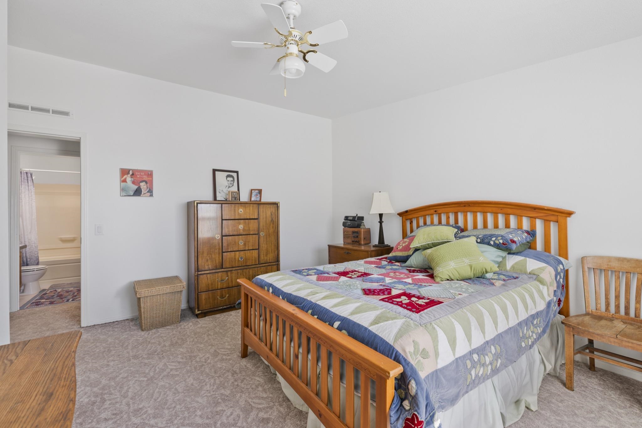 790 Cemetery Road Lee Vining, CA 93541 - Photo 26 of 39 Light-colored wall-to-wall carpeting throughout, with a ceiling fan overhead