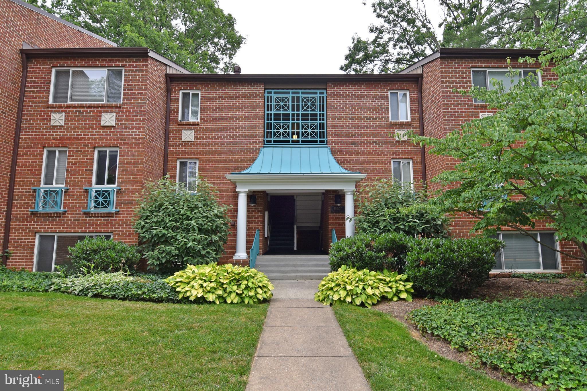 11827 Breton Court, Unit 1A Reston, VA 20191 - Photo 1 of 27 Exterior (Front)