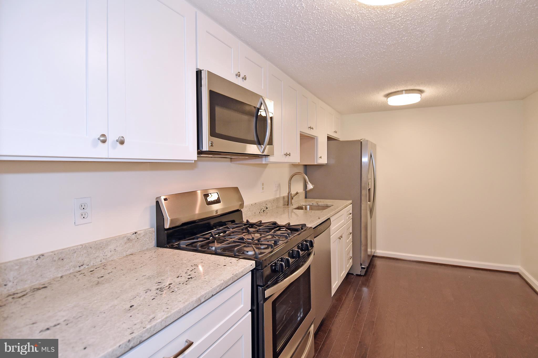 11827 Breton Court, Unit 1A Reston, VA 20191 - Photo 2 of 27 Kitchen