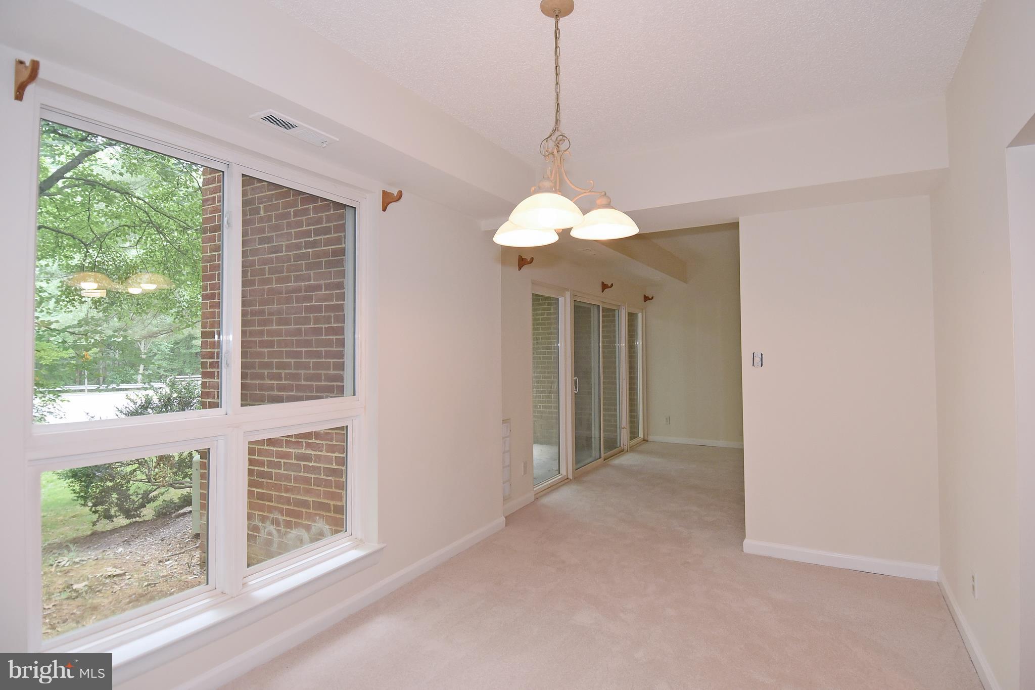 11827 Breton Court, Unit 1A Reston, VA 20191 - Photo 13 of 27 Dining Room