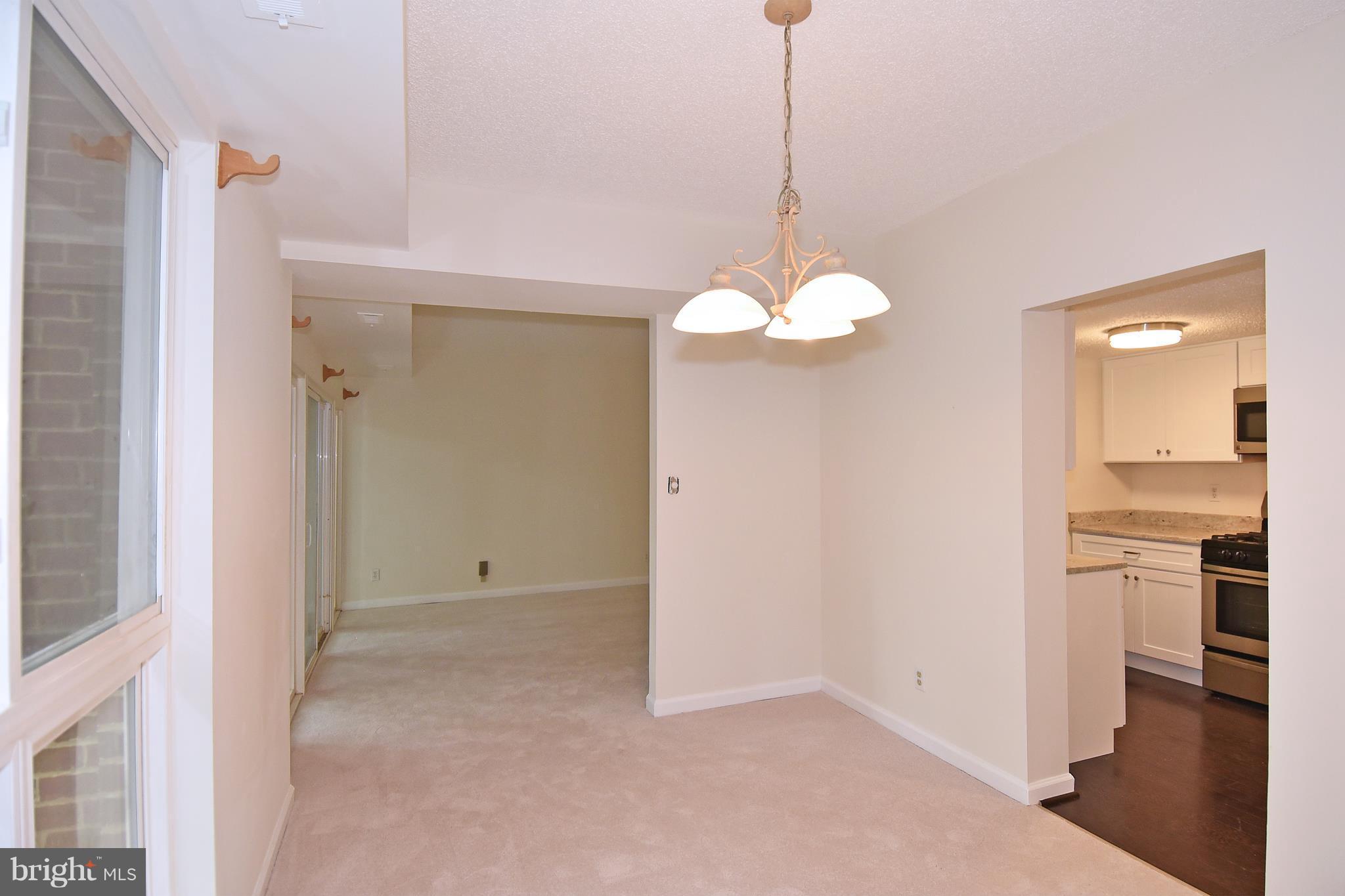 11827 Breton Court, Unit 1A Reston, VA 20191 - Photo 14 of 27 Dining Room
