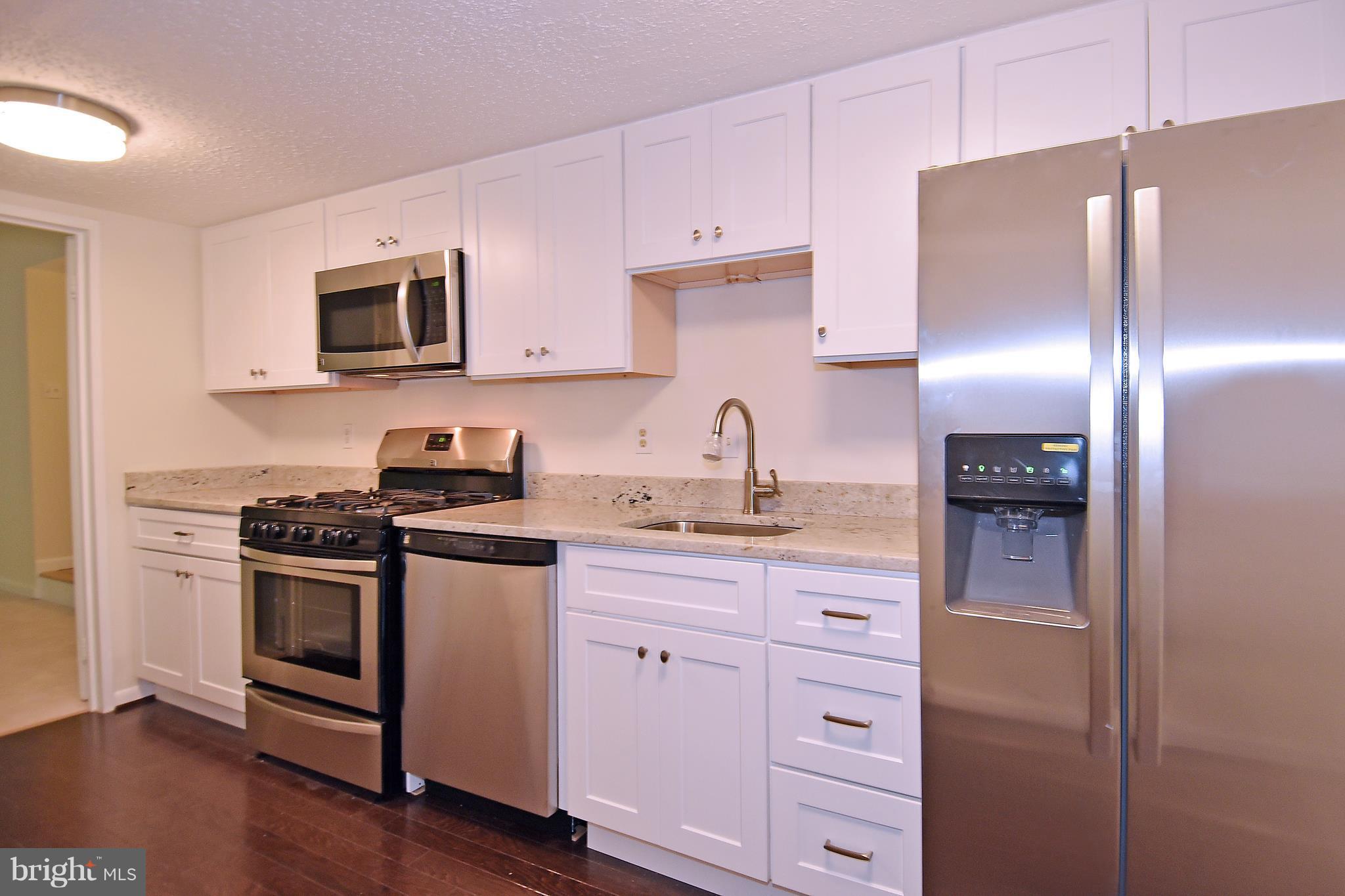 11827 Breton Court, Unit 1A Reston, VA 20191 - Photo 4 of 27 Kitchen