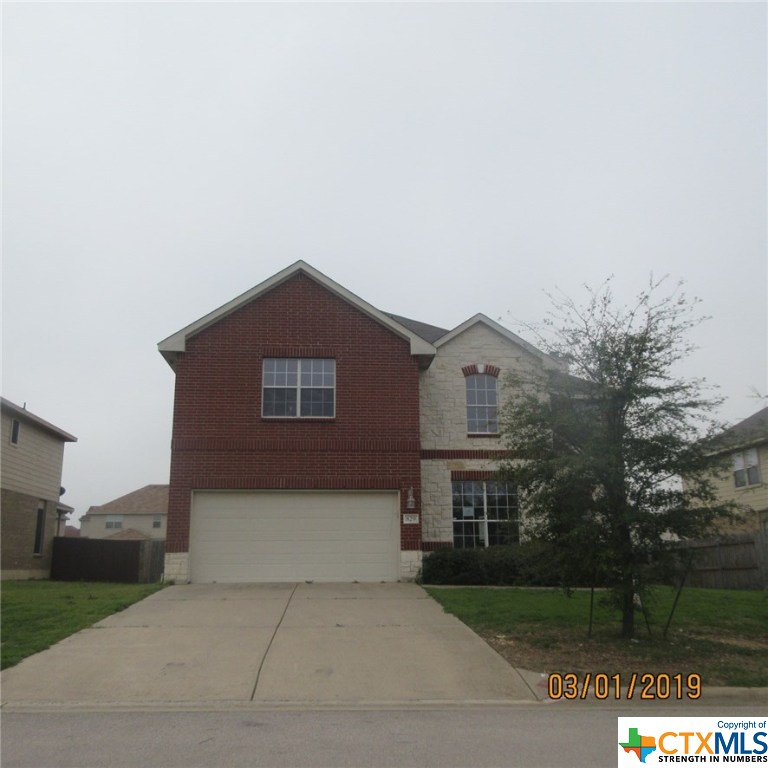 a house view with a outdoor space