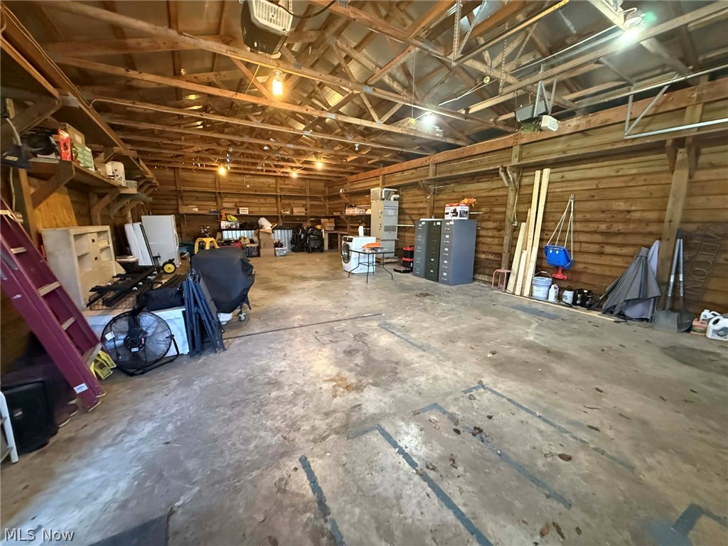 7170 Old Town Road Mount Perry, OH 43760 - Photo 37 of 41 Garage featuring a garage door opener