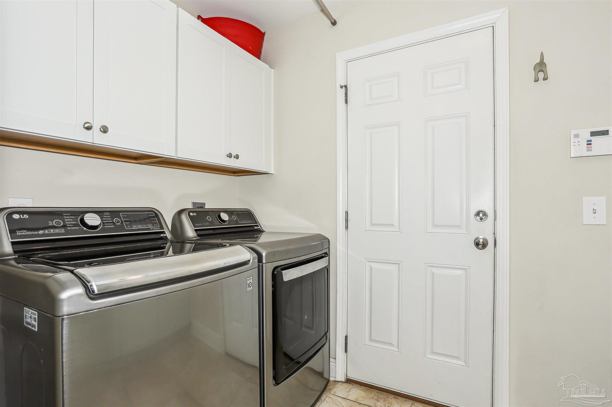 7305 Farmers Road Pensacola, FL 32526 - Photo 16 of 47 a utility room with dryer and washer