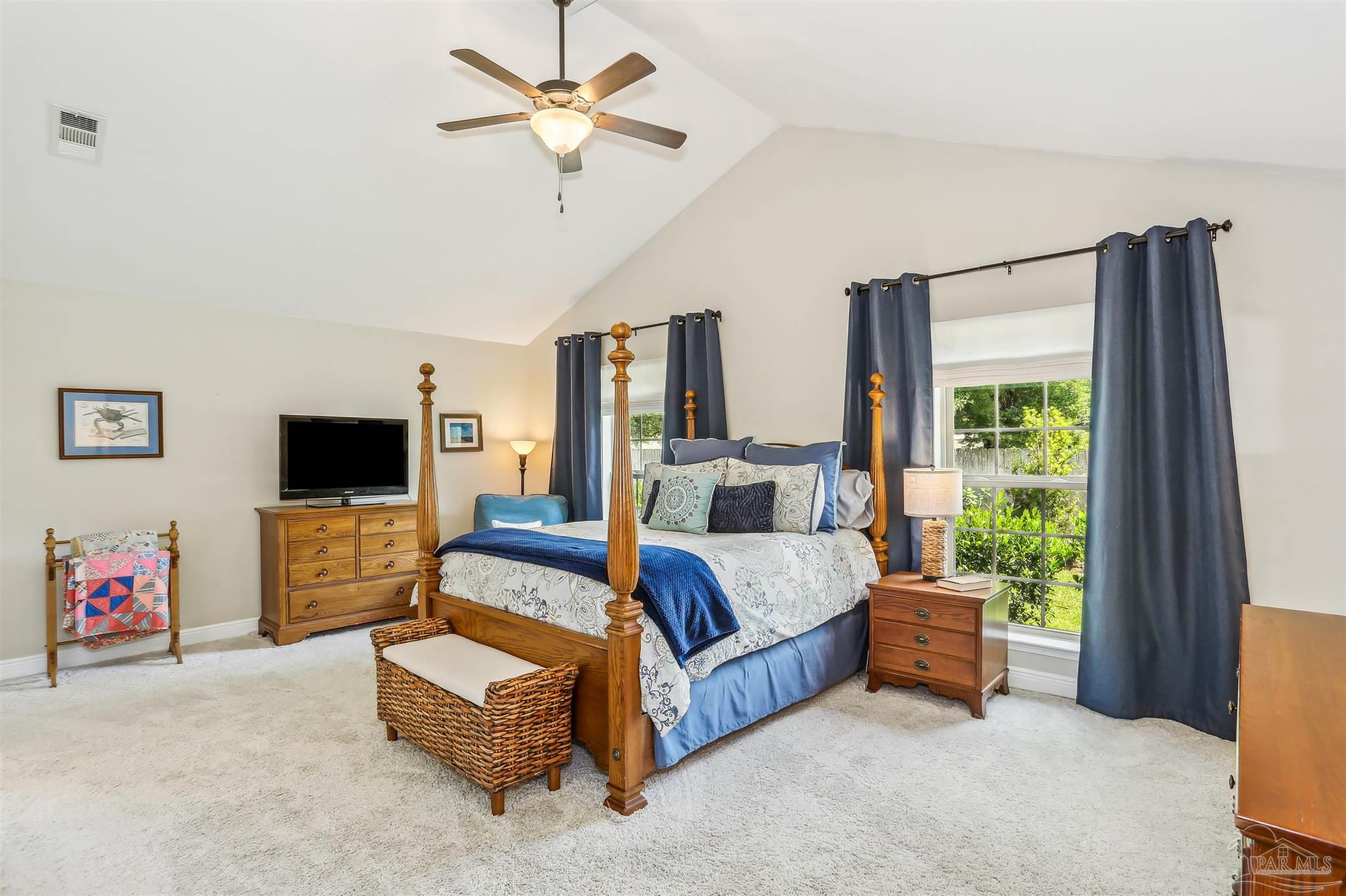 7305 Farmers Road Pensacola, FL 32526 - Photo 18 of 47 a bedroom with a bed couch and window