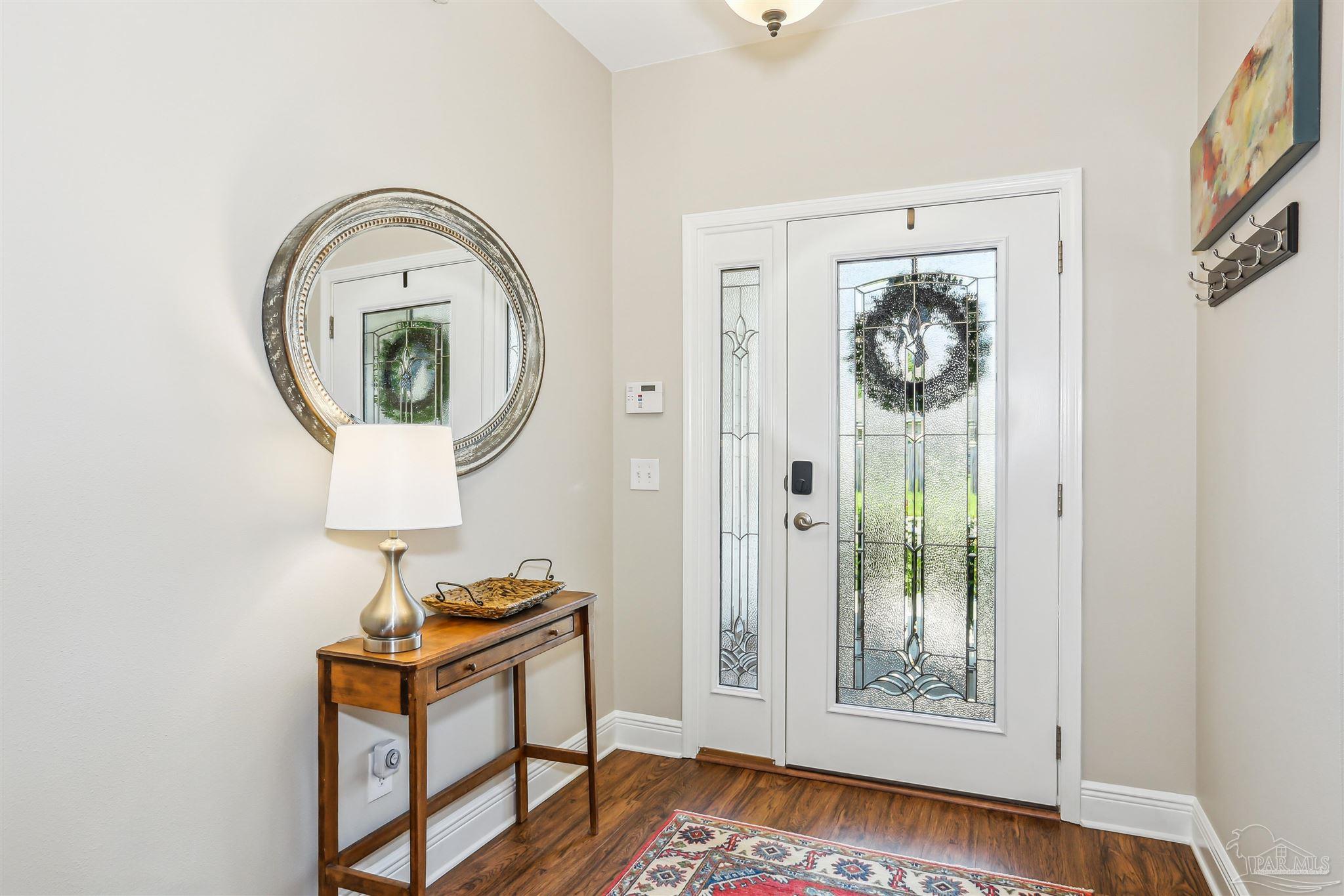 7305 Farmers Road Pensacola, FL 32526 - Photo 6 of 47 a view of dining room with wooden floor