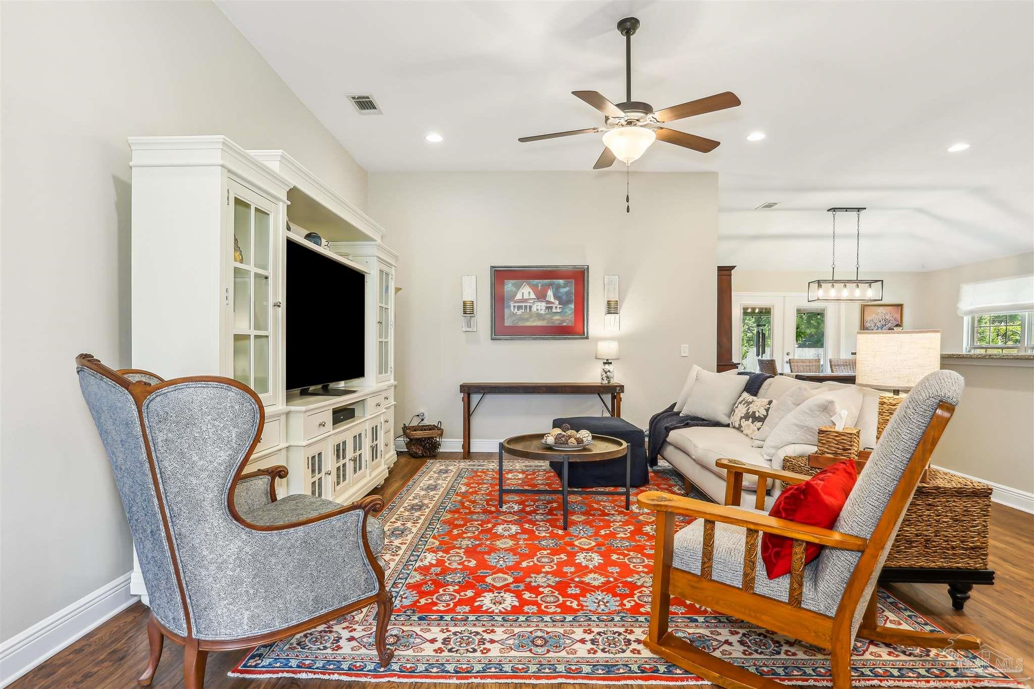 7305 Farmers Road Pensacola, FL 32526 - Photo 7 of 47 a living room with furniture and a flat screen tv