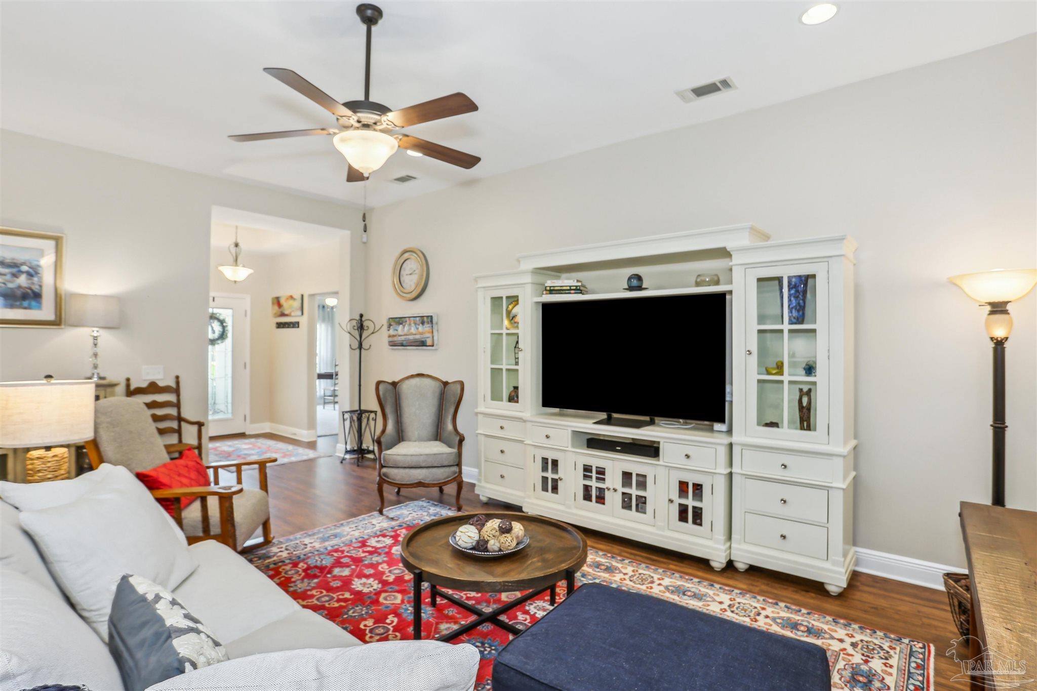 7305 Farmers Road Pensacola, FL 32526 - Photo 9 of 47 a living room with furniture and a flat screen tv