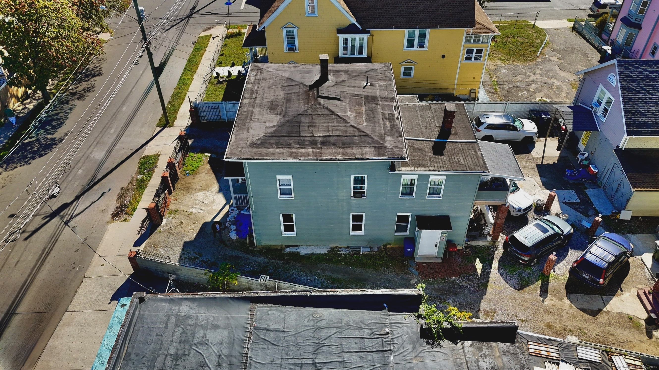 Undisclosed Address Bridgeport, CT 06608 - Photo 3 of 18 an aerial view of multiple houses