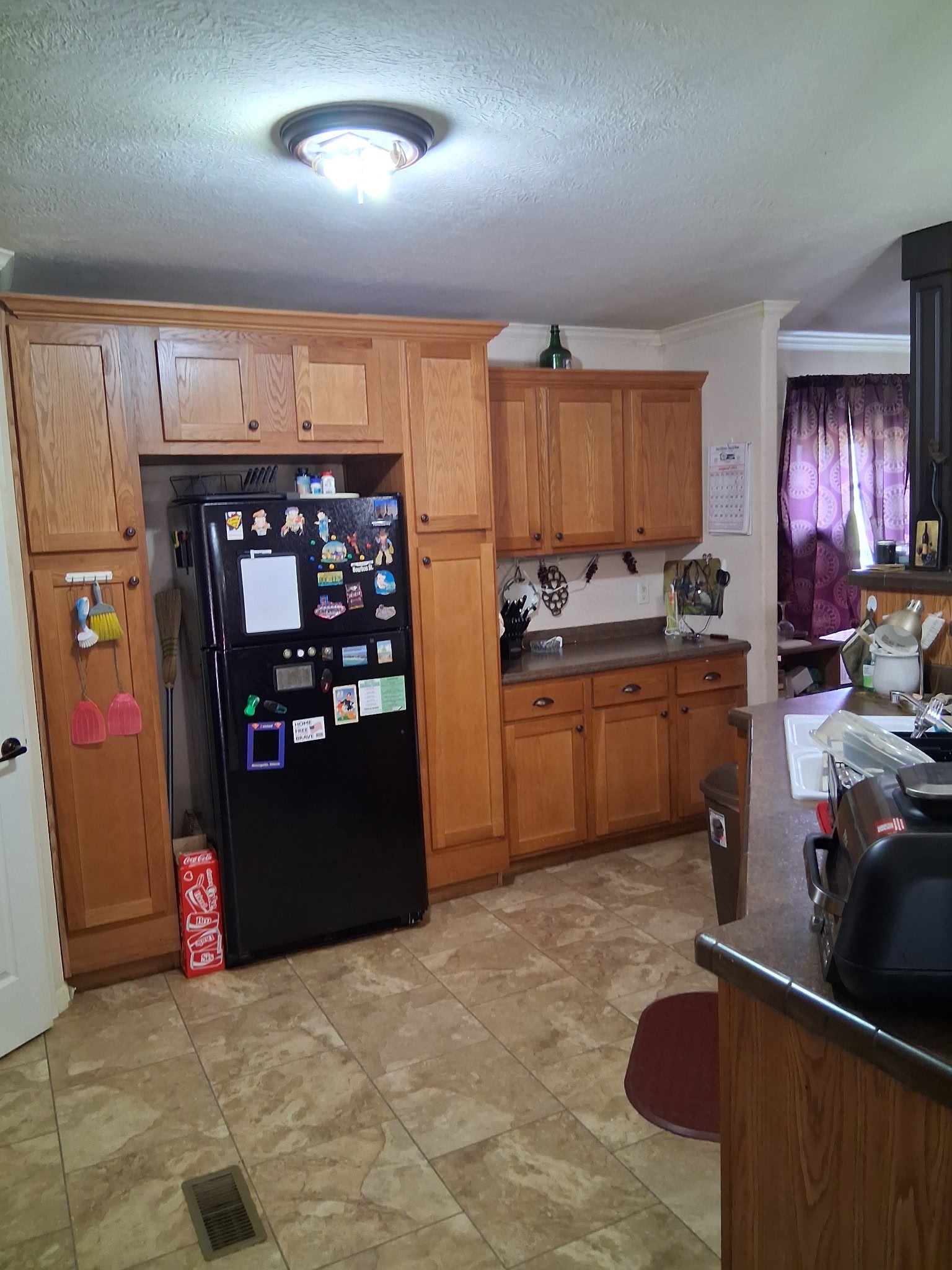 241 Greenfield Road Prospect, TN 38477 - Photo 12 of 32 a kitchen with refrigerator and window