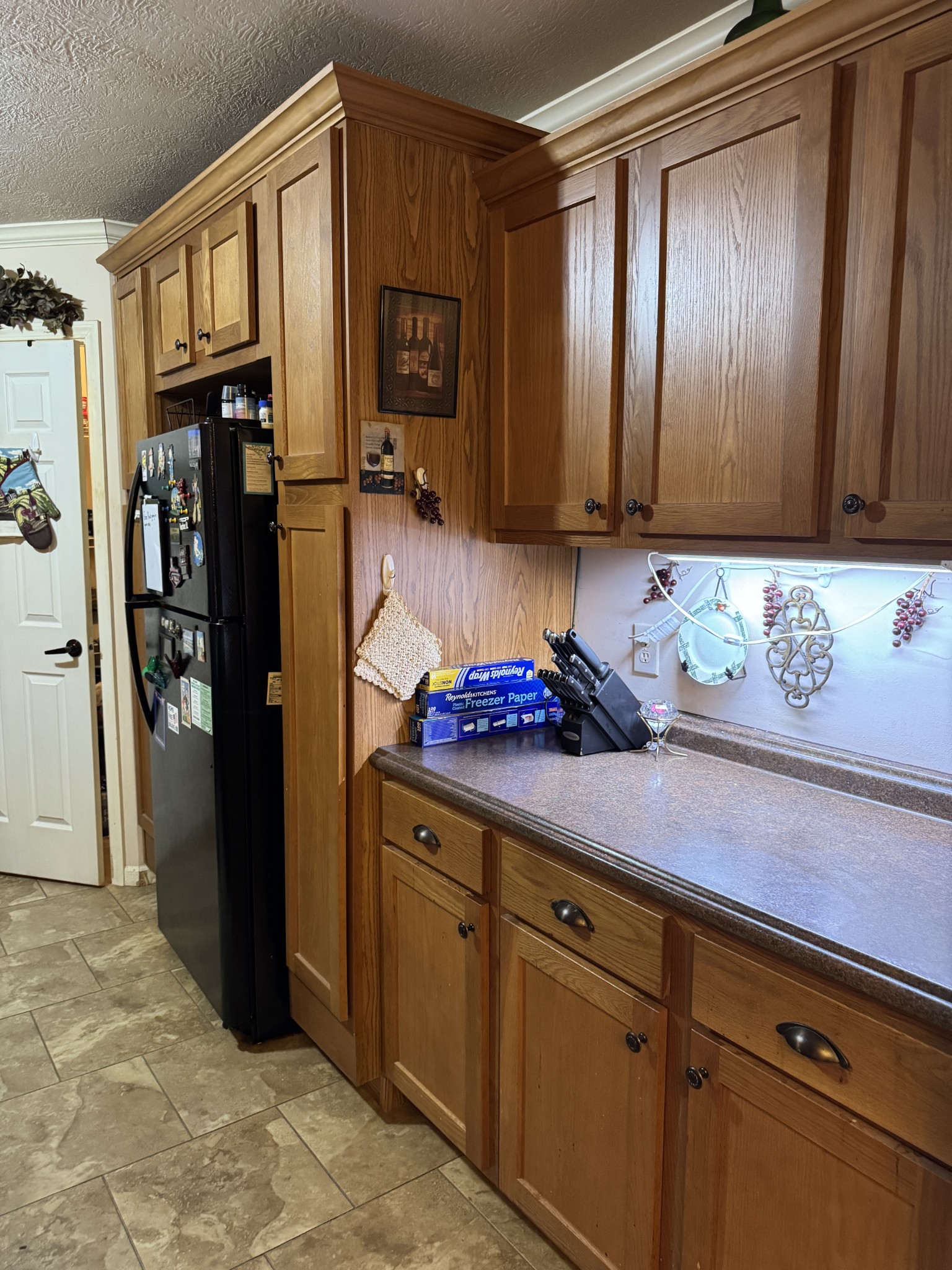 241 Greenfield Road Prospect, TN 38477 - Photo 13 of 32 a kitchen with stainless steel appliances granite countertop a refrigerator and a sink