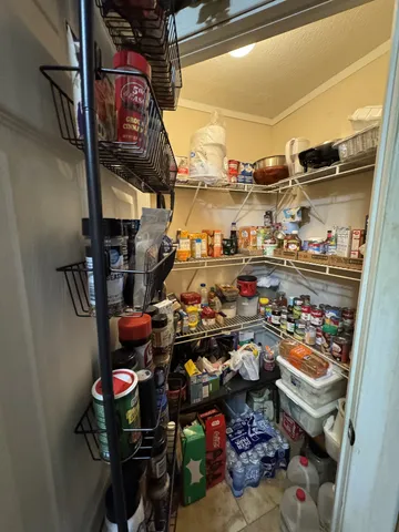 a view of a kitchen with appliances and cabinets
