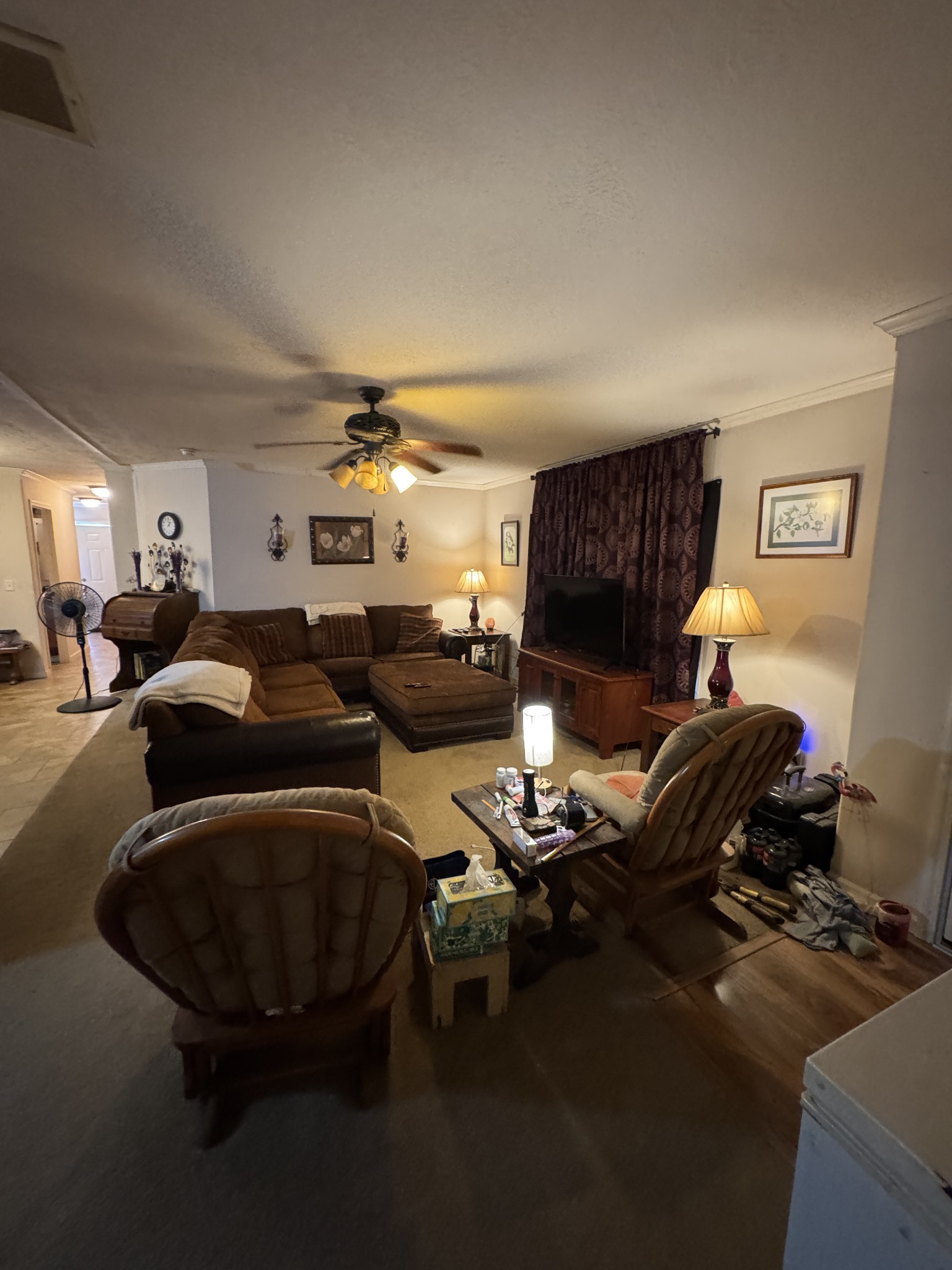 241 Greenfield Road Prospect, TN 38477 - Photo 20 of 32 a living room with furniture a fireplace and lots of windows