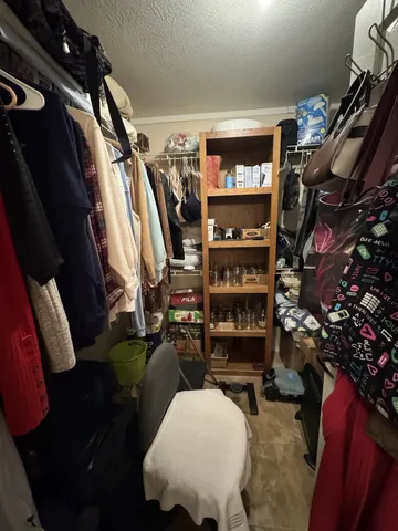 a room with a table and chairs