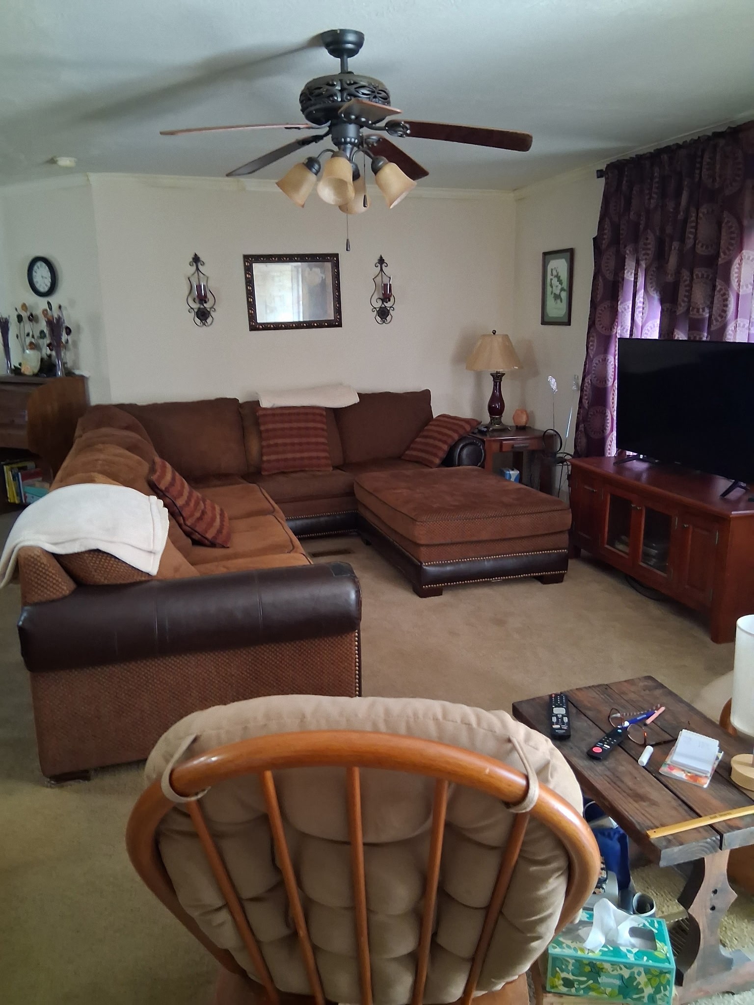 241 Greenfield Road Prospect, TN 38477 - Photo 28 of 32 a living room with furniture ceiling fan and a rug