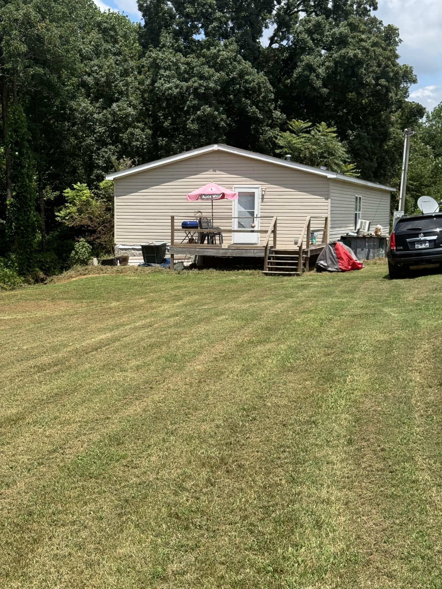 241 Greenfield Road Prospect, TN 38477 - Photo 4 of 32 a bus parked in front of a house
