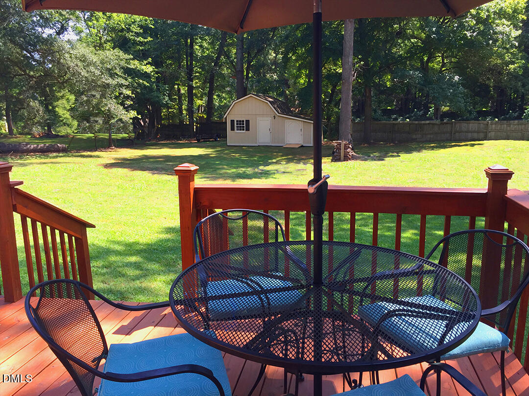 6404 Buffaloe Road Raleigh, NC 27616 - Photo 2 of 12 a view of a chairs and table in the patio