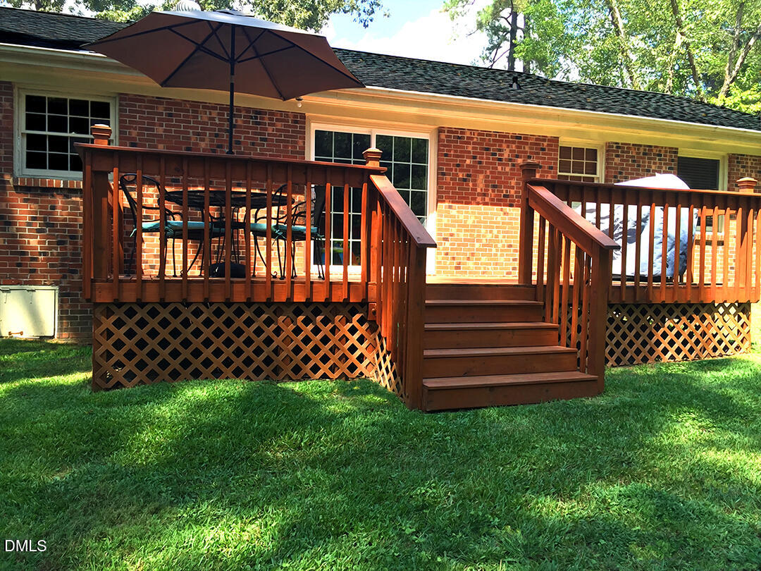 6404 Buffaloe Road Raleigh, NC 27616 - Photo 3 of 12 a front view of a house with garden