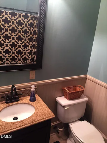 a bathroom with a sink and a toilet
