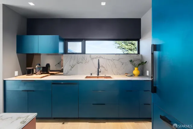 a bedroom with a bed and a cabinets