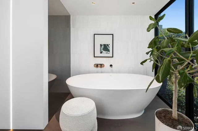 a workspace room with furniture and wooden floor