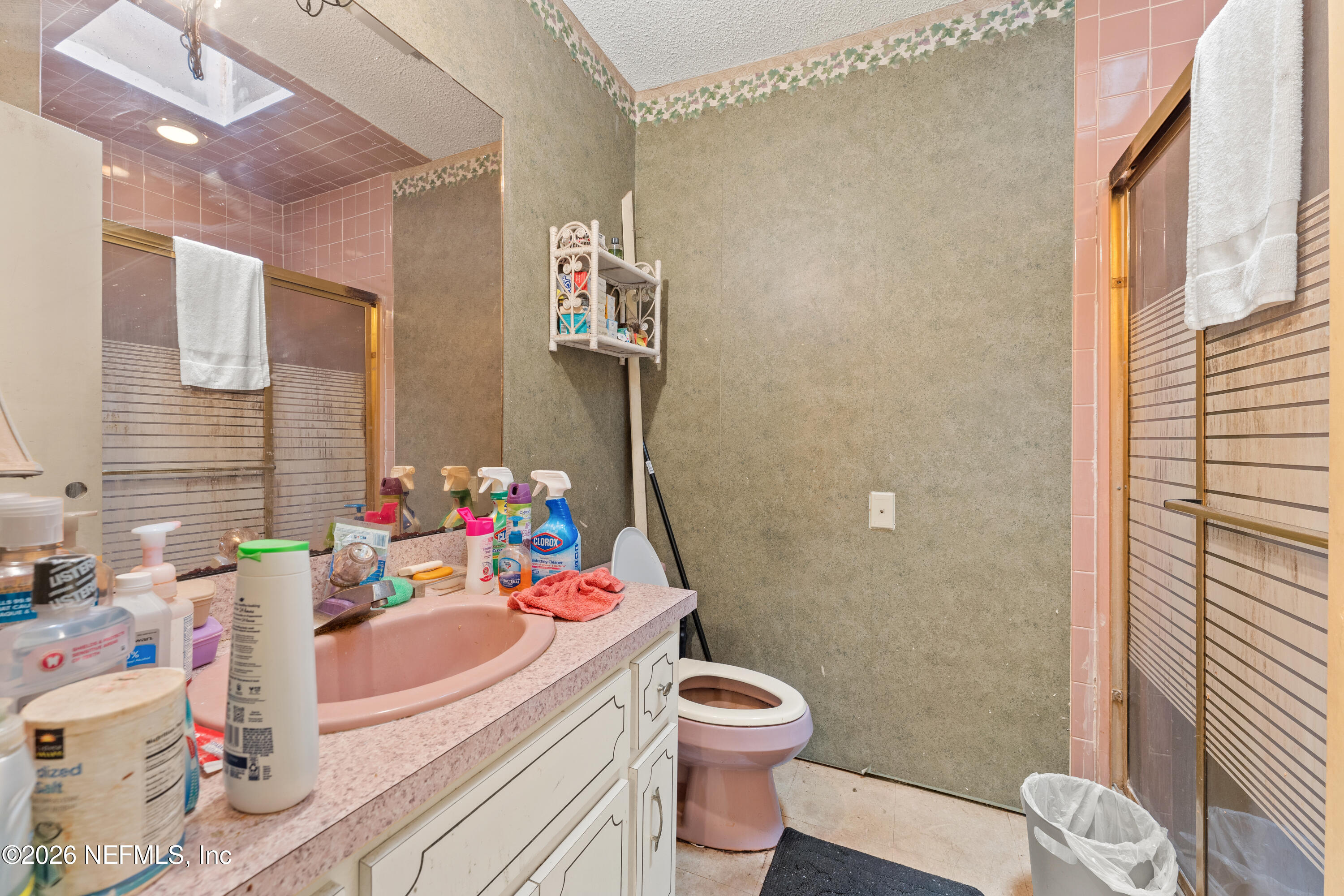 43001 Egger Place Callahan, FL 32011 - Photo 28 of 53 a bathroom with a sink mirror vanity and toilet