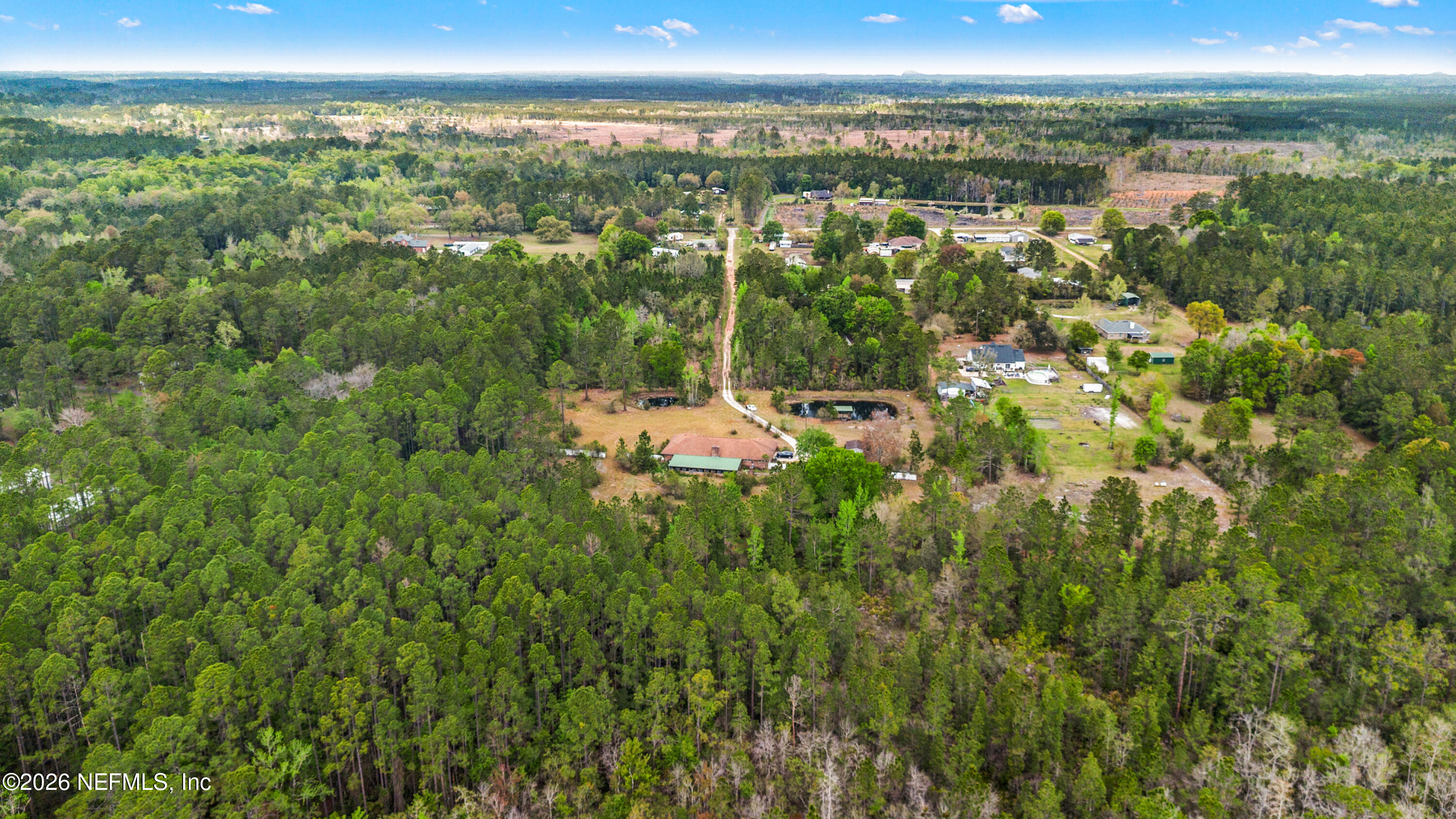 43001 Egger Place Callahan, FL 32011 - Photo 47 of 53 a view of a city with lush green forest