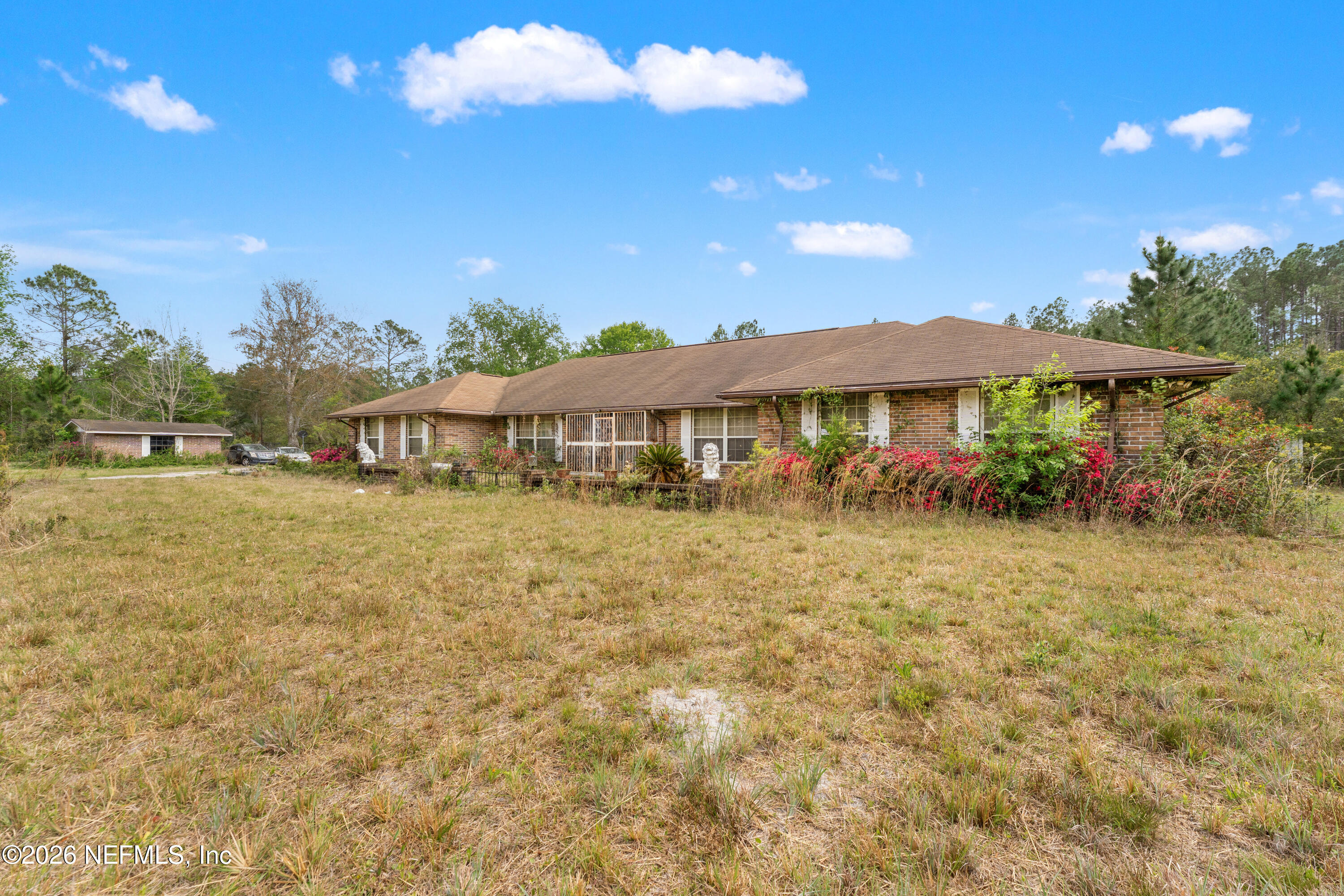 43001 Egger Place Callahan, FL 32011 - Photo 5 of 53 a view of a house with a yard