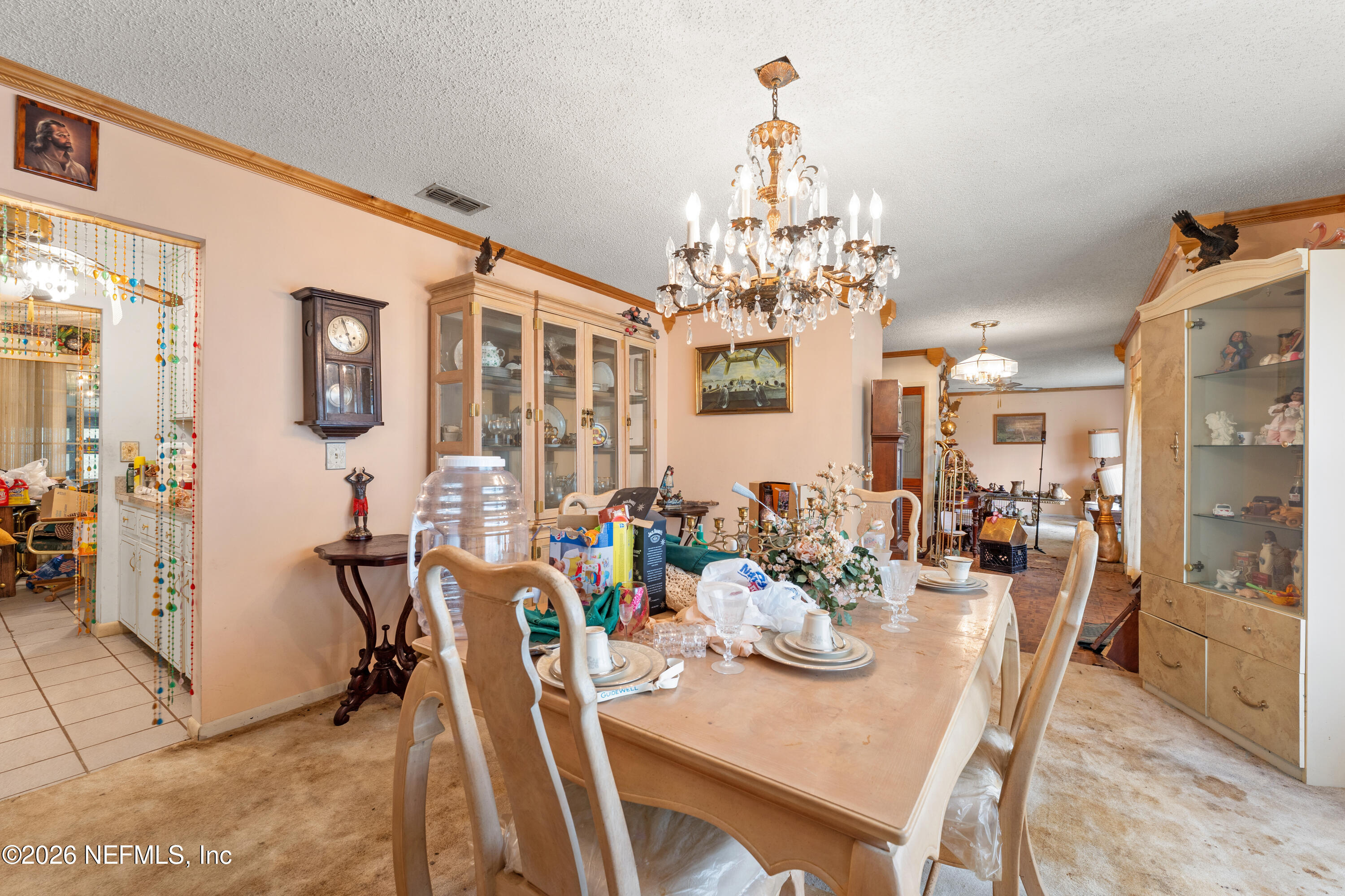 43001 Egger Place Callahan, FL 32011 - Photo 8 of 53 a view of a dining room with furniture and chandelier