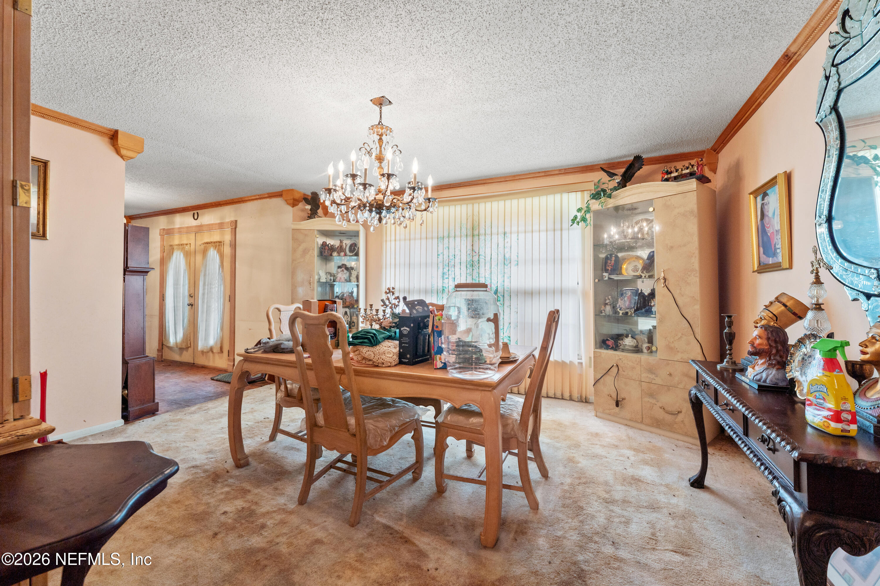 43001 Egger Place Callahan, FL 32011 - Photo 9 of 53 a view of a dining room with furniture and chandelier