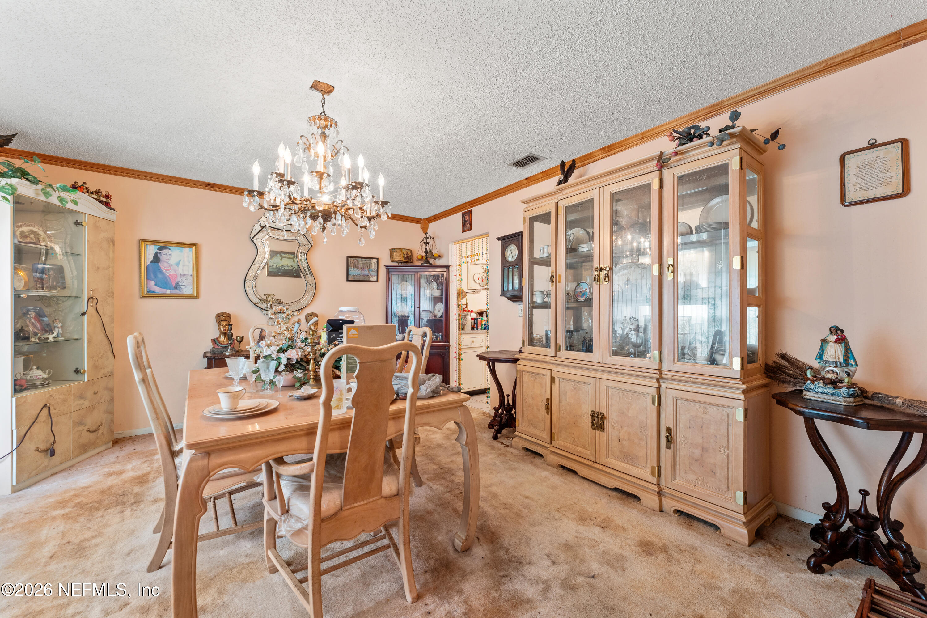 43001 Egger Place Callahan, FL 32011 - Photo 10 of 53 a view of a dining room with furniture and chandelier