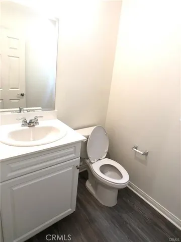a bathroom with a toilet and a sink