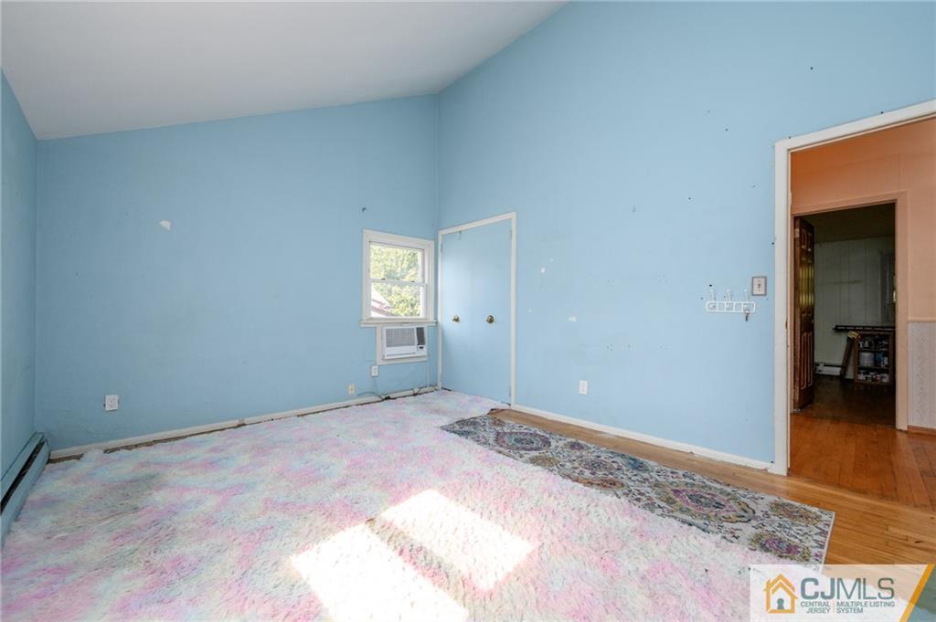 7 Florence Drive Sayreville, NJ 08859 - Photo 20 of 42 a view of an empty room and window
