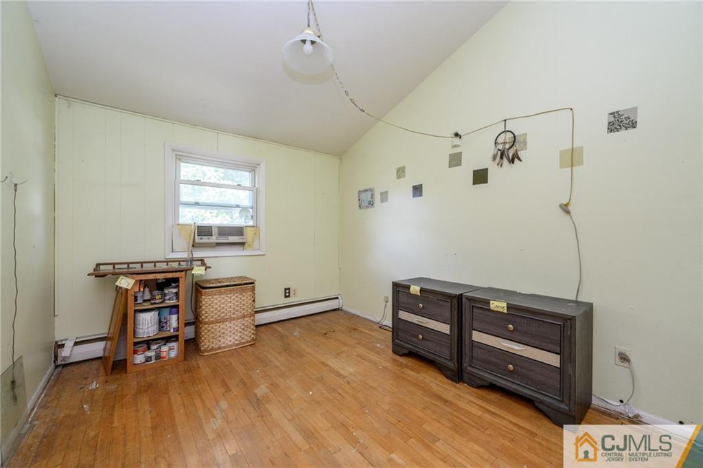 7 Florence Drive Sayreville, NJ 08859 - Photo 25 of 42 a view of room with toys and wooden floor