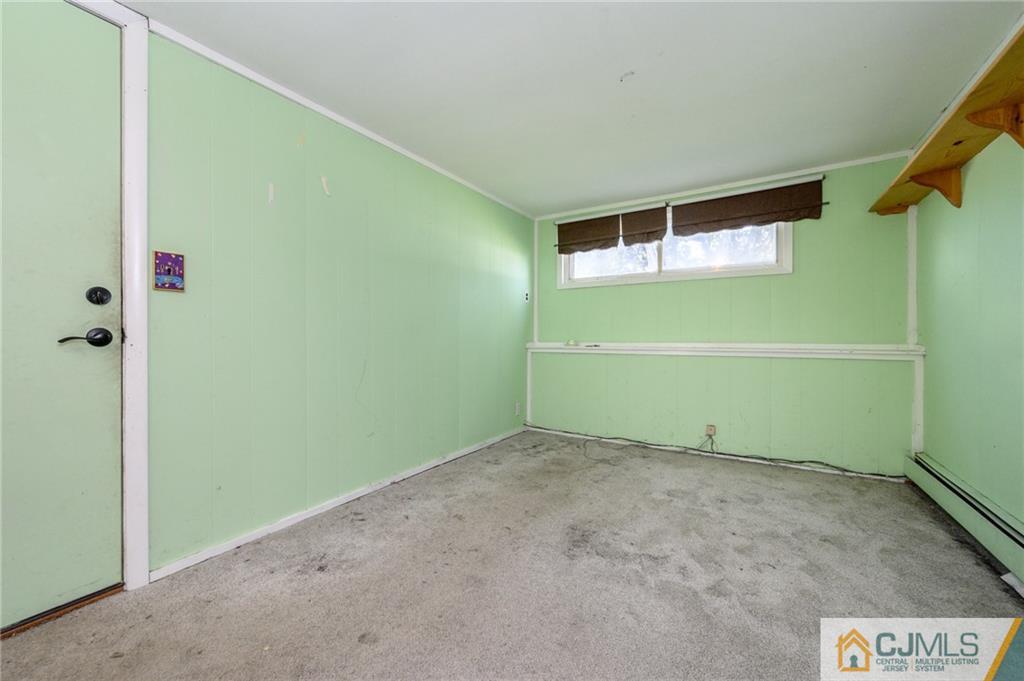 7 Florence Drive Sayreville, NJ 08859 - Photo 31 of 42 a room with a walk in closet and closet