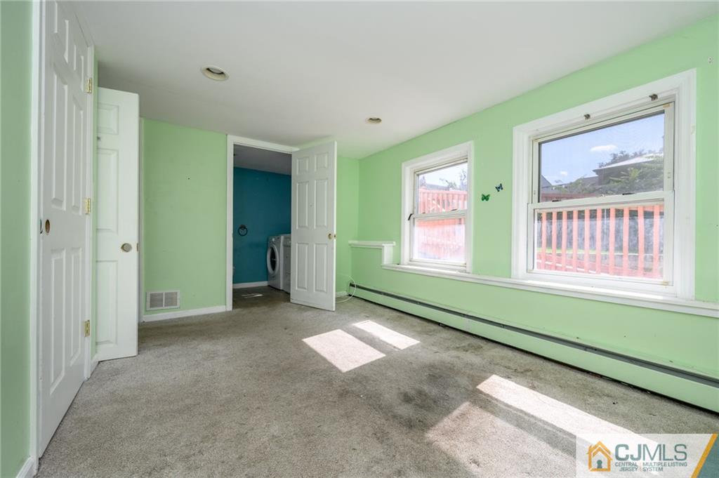 7 Florence Drive Sayreville, NJ 08859 - Photo 34 of 42 a view of an empty room with window